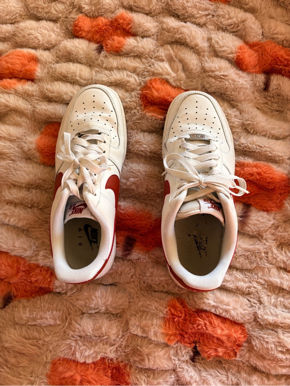 Nike Women's Low-Top Sneakers in White with Red Swoosh